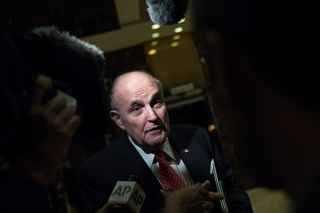 Rudy Giuliani talks to the press