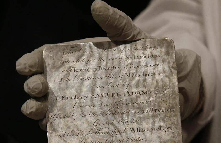 Newspapers, coins found inside of time capsule buried by Paul Revere, Samuel Adams