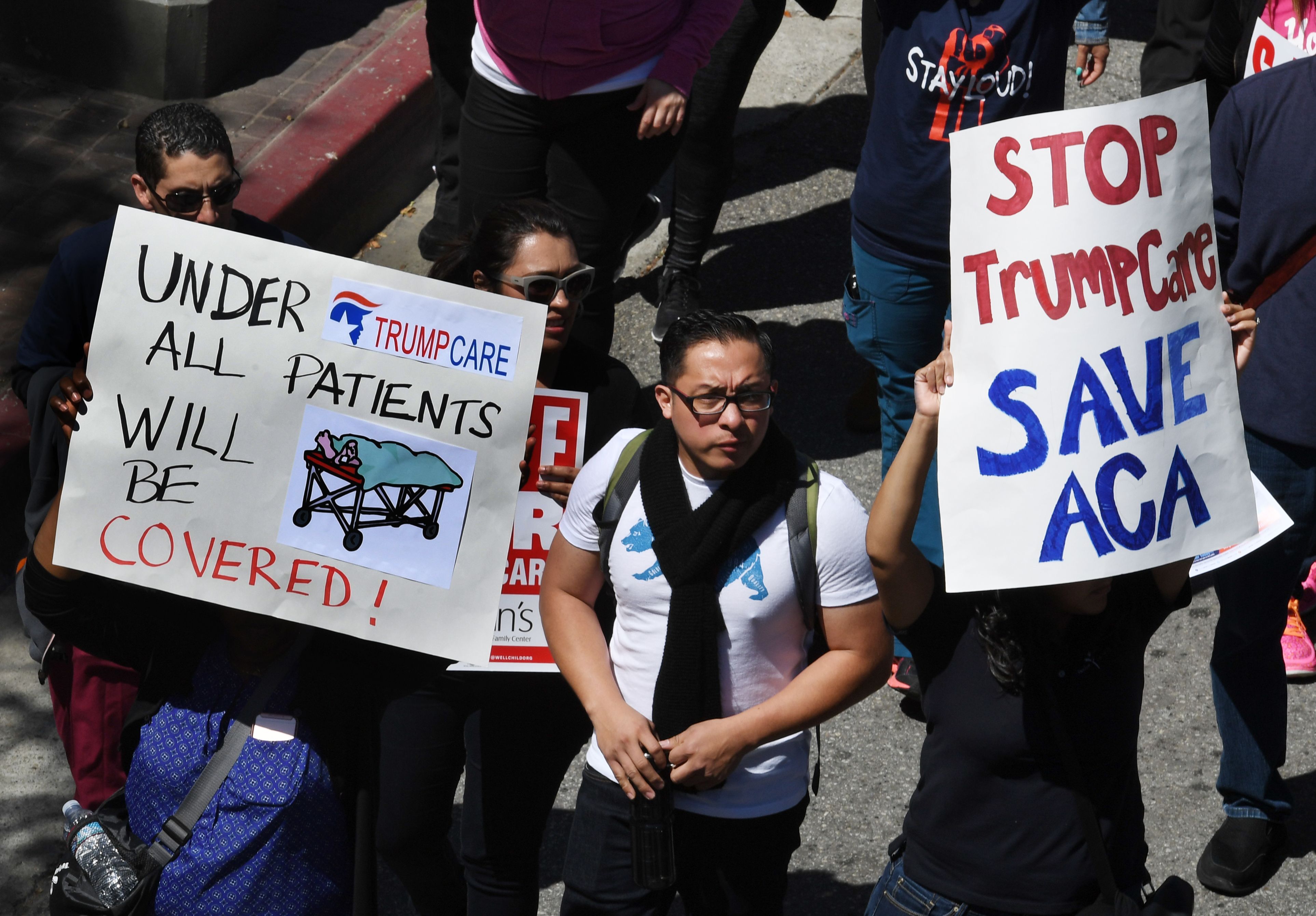 Protesters march towards the Federal Building during a &#039;Save the Affordable Care Act&#039; rally in Los Angeles, California on March 23, 2017. 
