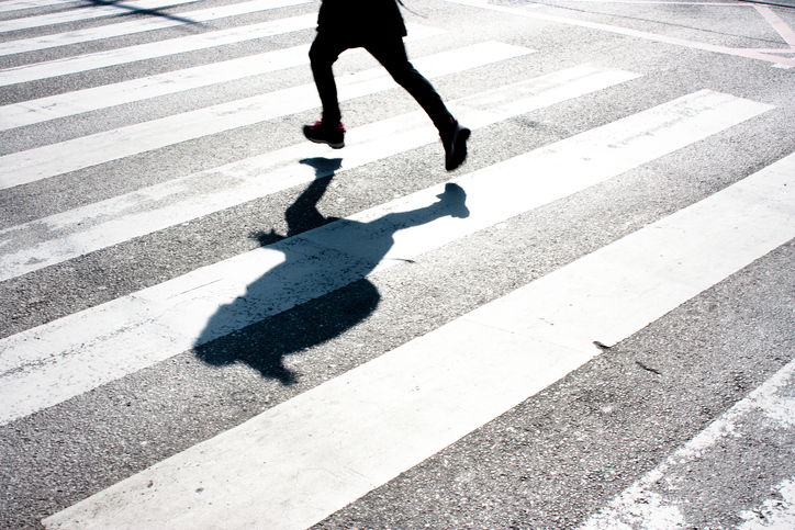 A person crossing the street.