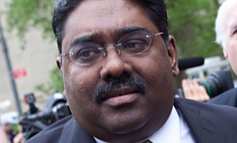 Galleon Group founder Raj Rajaratnam leaves court in New York Wednesday after being found guilty on 14 charges of securities fraud and conspiracy.