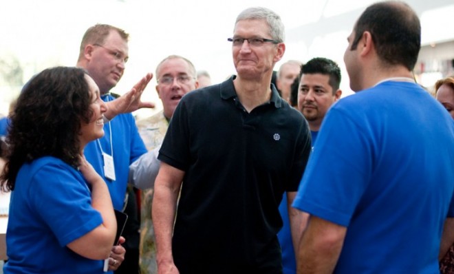Apple CEO stops by a California store in October 2012: A major Apple investor is demanding compensation for falling shares.