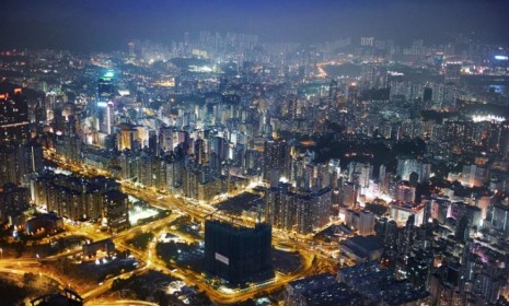 Aerial view of Hong Kong at night: According to University of California at Berkeley scientists, the Earth has already started to see some irreversible changes including outbreaks of invasive