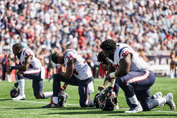 Members of the Houston Texans knelt in solidarity on Sunday. 