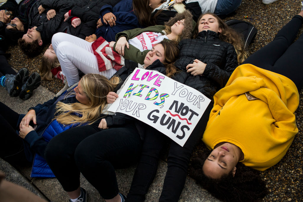 Teens hold a &quot;lie in&quot; at the White House Monday.