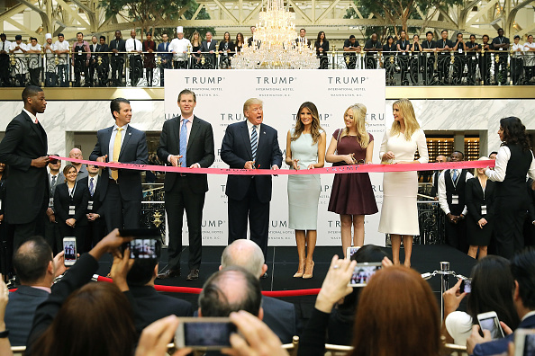 Trump cuts the ribbon at the opening of his hotel in Washington, D.C. in 2016.