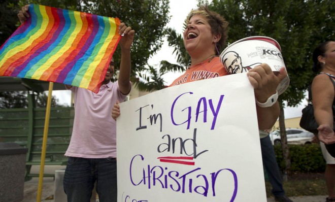 Carri Jo Anderson protests in front of a Chick-fil-A in Pompano Beach, Fla., in August 2012. The company&#039;s Christian owners are against same-sex marriage.