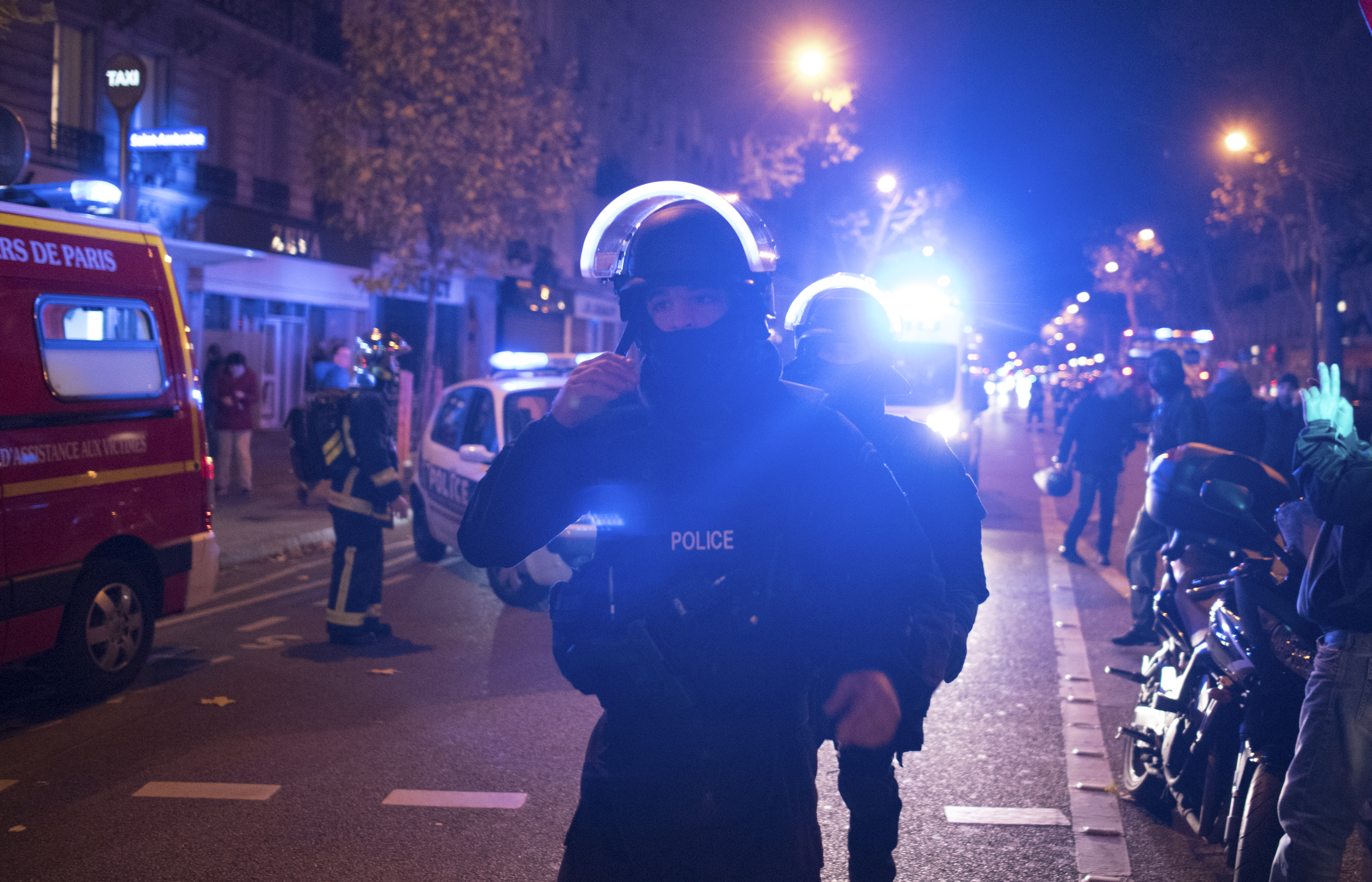 Elite police officers arrive to the Bataclan concert venue after the deadly attacks in Paris.