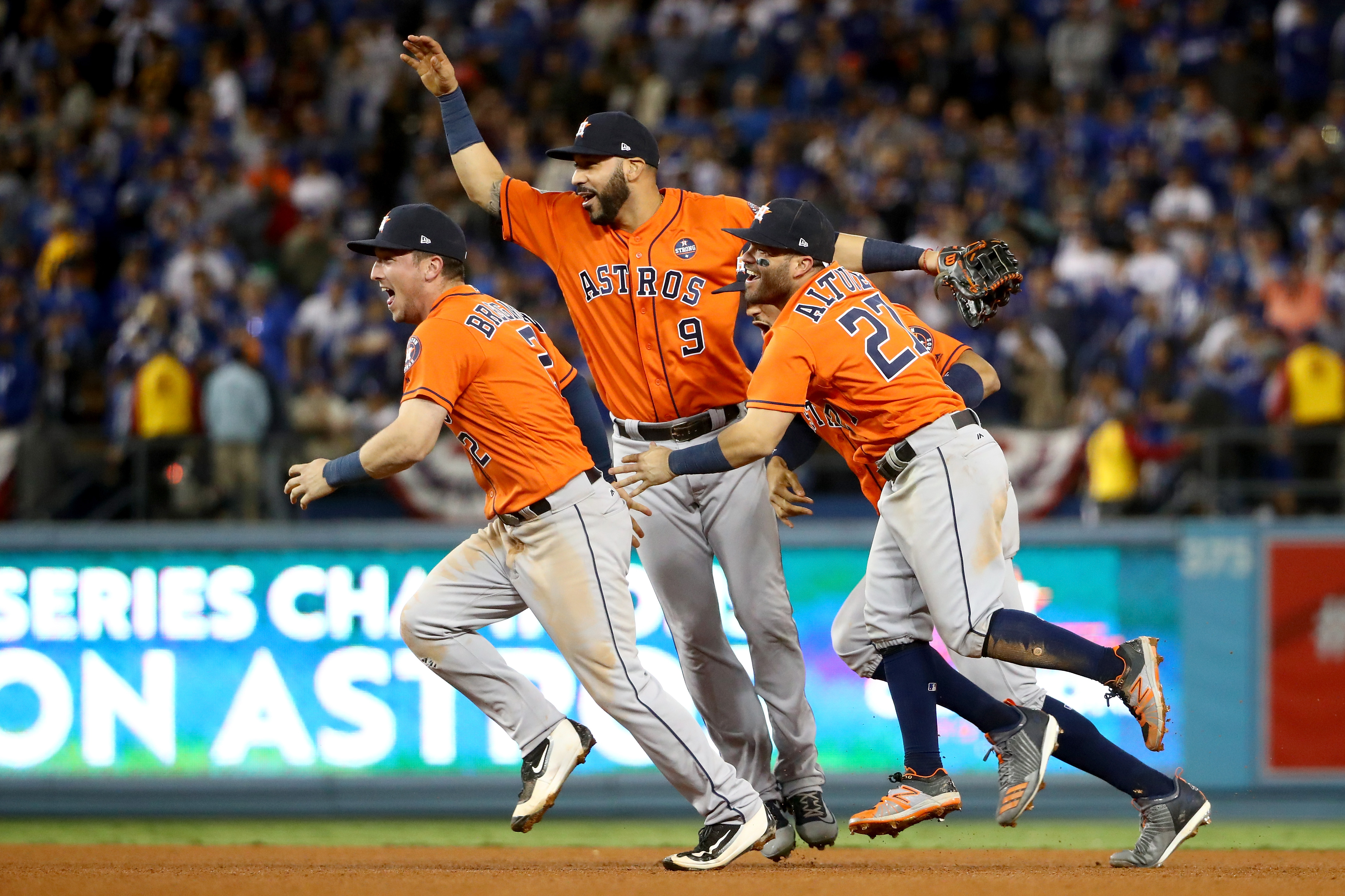Houston Astros team members celebrate their World Series win