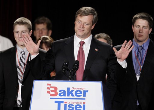 Republican Charlie Baker concedes defeat in the Massachusetts governors race as his sons AJ, left, and Charlie, right, look on at a nightclub in Boston, Tuesday, Nov. 2, 2010. 