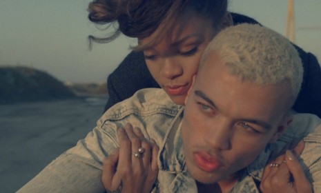 Rihanna&#039;s new video &quot;We Found Love&quot; features a Chris Brown look alike and a whirlwind relationship that ends in a fight.