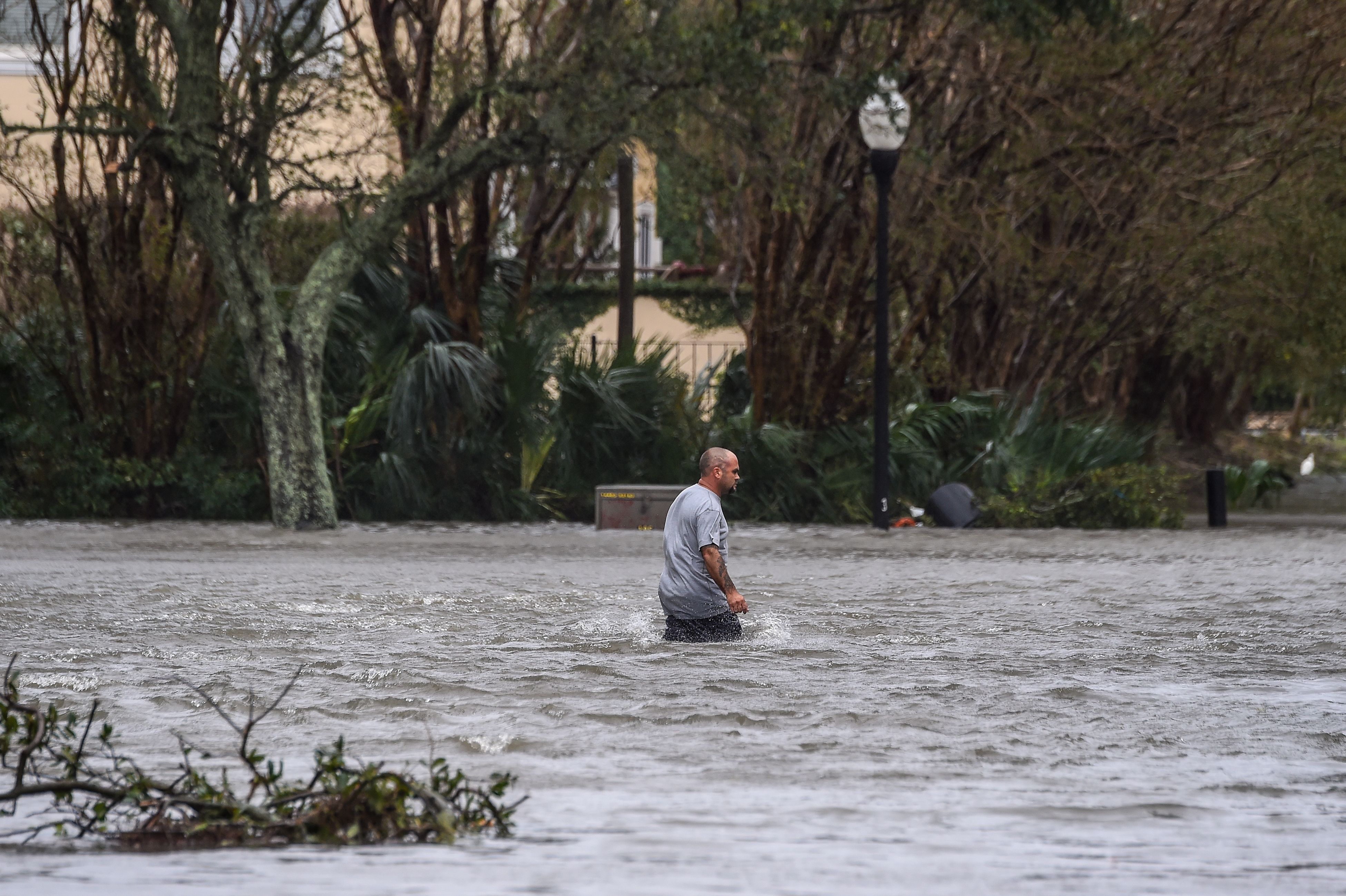 A man in Florida in Hurricane Sally flooding