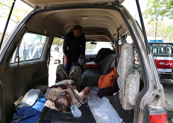 Injured man in ambulance after Afghanistan fuel tanker crash