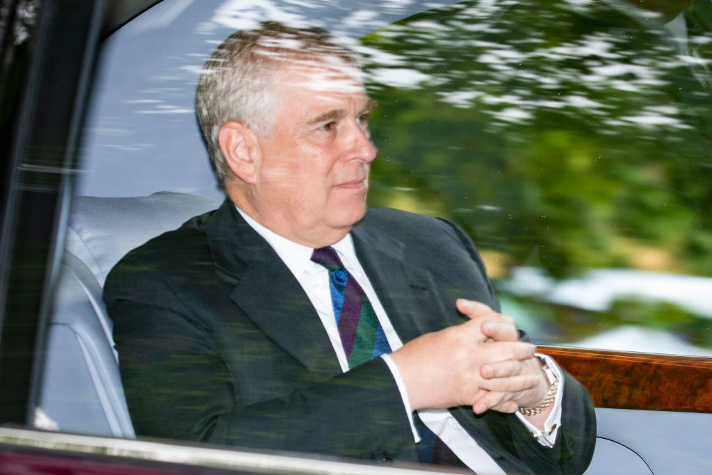 Prince Andrew inside a car.