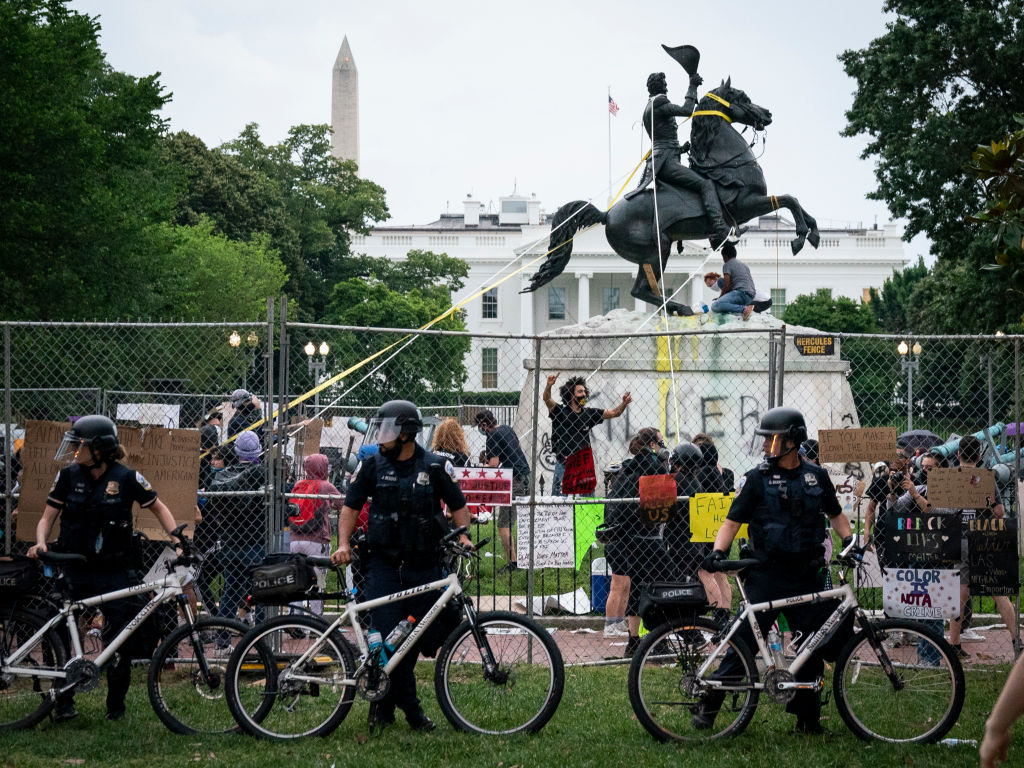 People try to tear down a statue of Andrew Jackson.