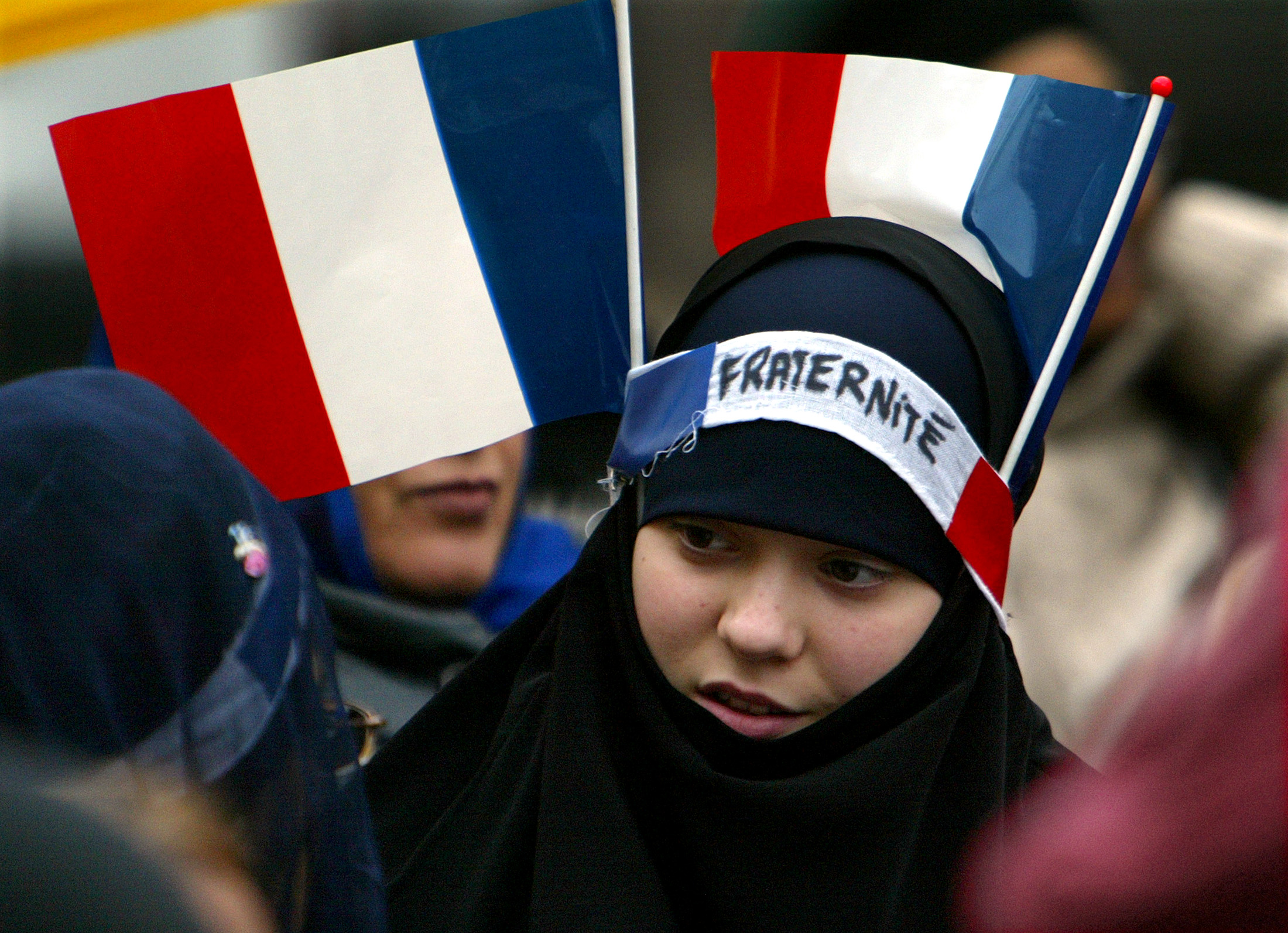 A young muslim girl protests in France in 2005.