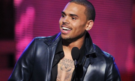 Chris Brown accepts the Grammy award for Best R&amp;B Album last Sunday: Brown followed his win with a Twitter tirade calling out all his haters only to gain more.