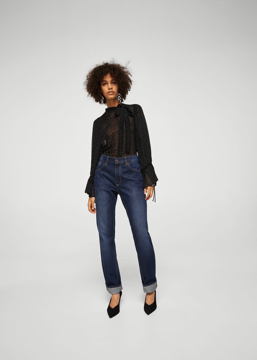Make a statement with this flared sleeve blouse from Mango.