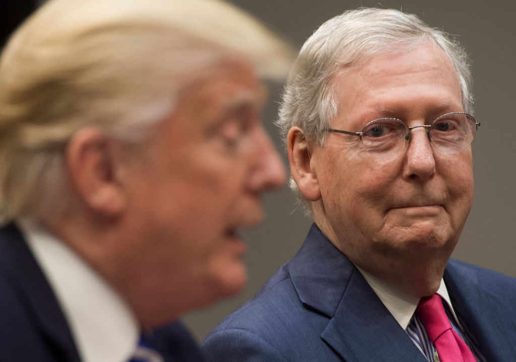 Mitch McConnell smiles