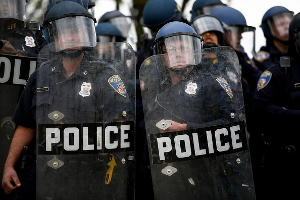 Baltimore Police Department officers in riot gear.