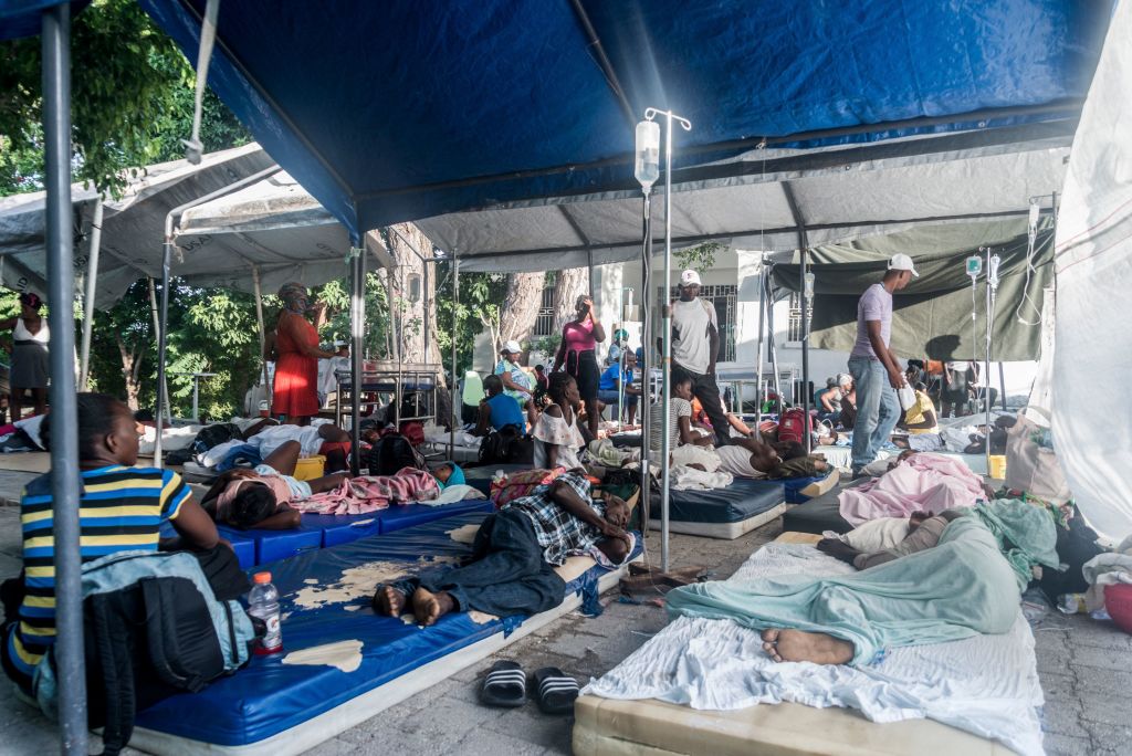 Tents set up outside of a Haitian hospital.