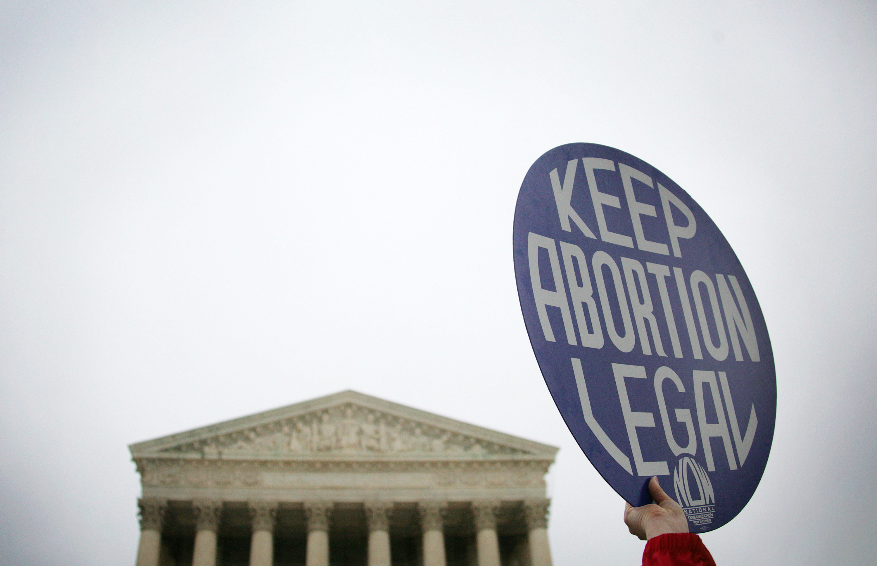 An abortion protester outside the Supreme Court
