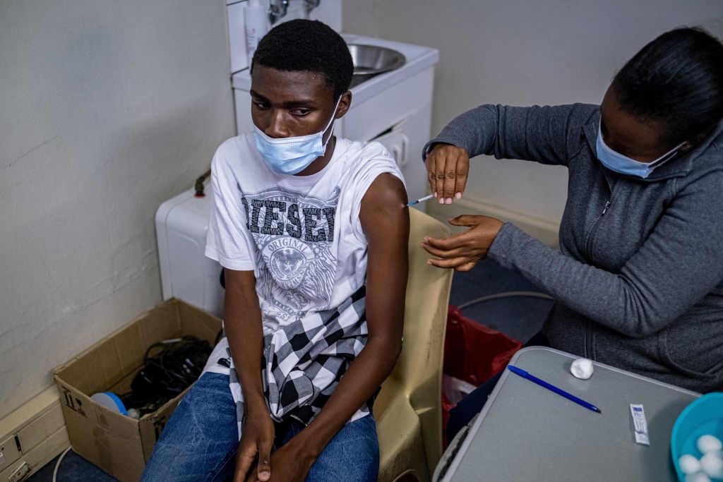 A man receives a COVID-19 vaccine in Johannesburg