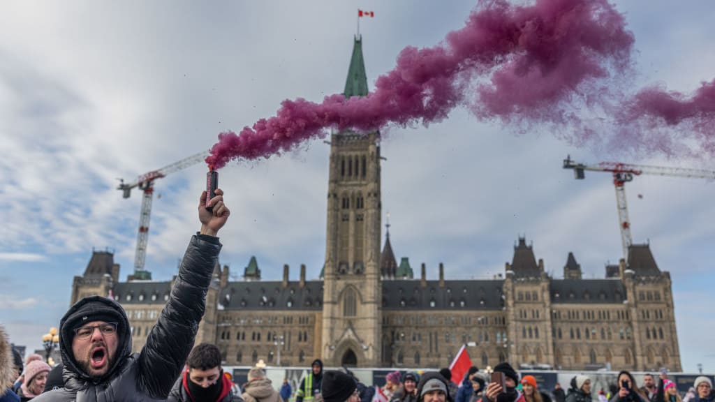 A protester in Ottawa screams.