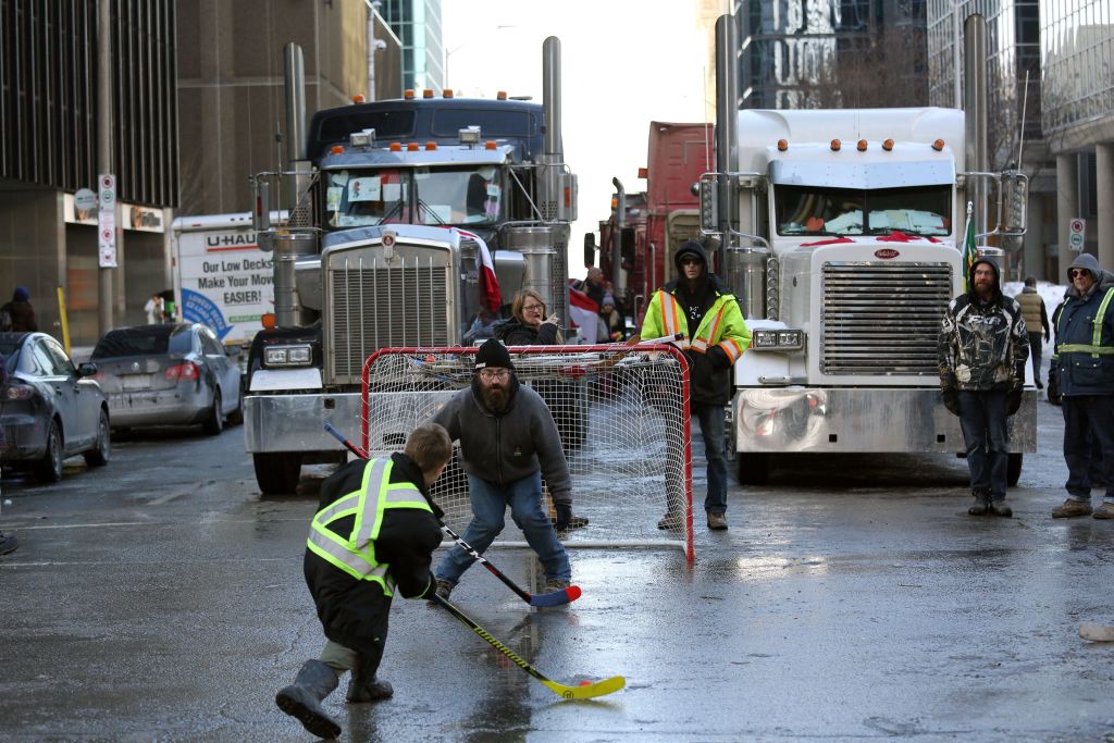 Freedom Convoy protesters playing street hockey