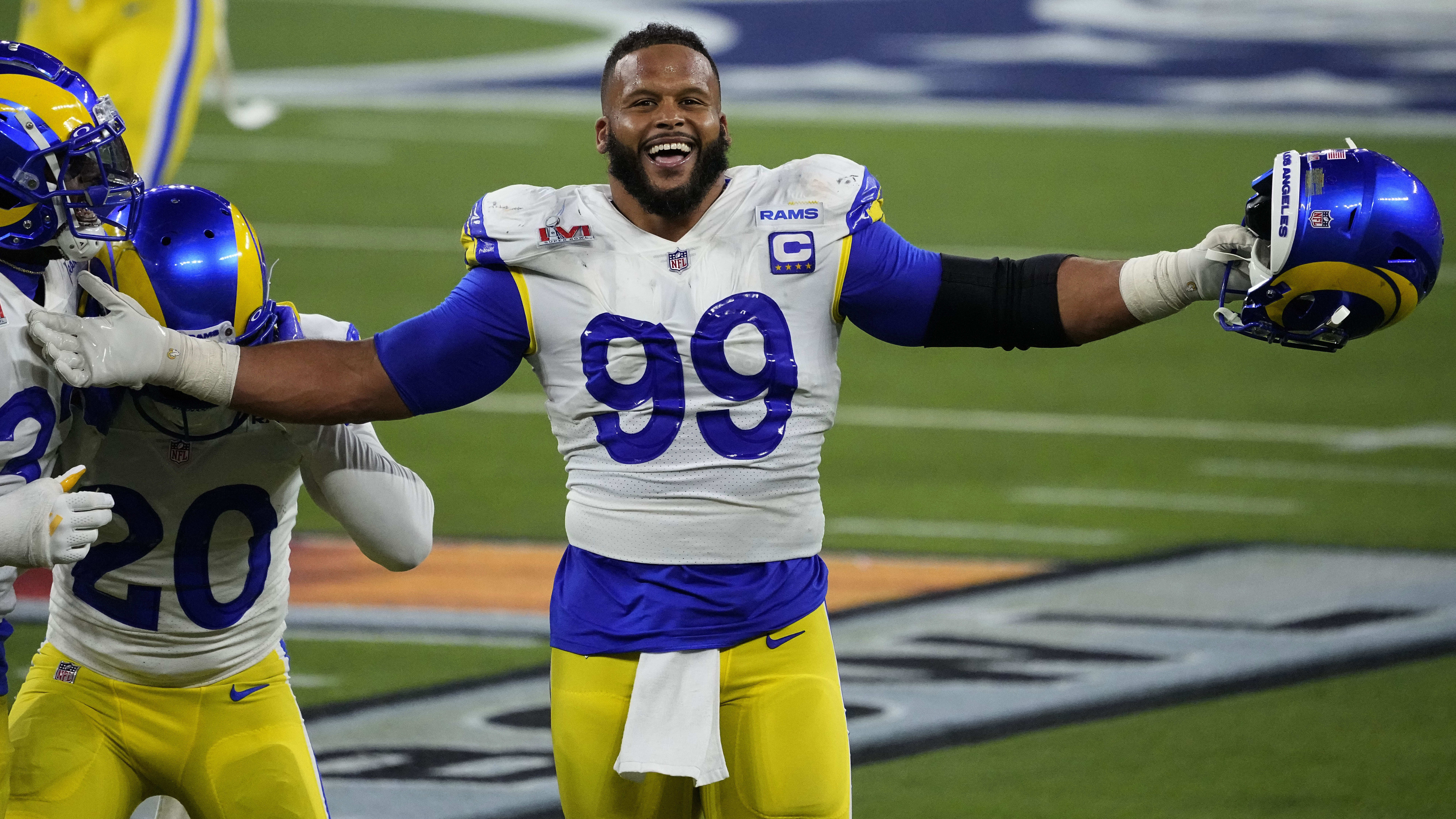 Los Angeles Rams defensive end Aaron Donald celebrates his team&#039;s Super Bowl win.