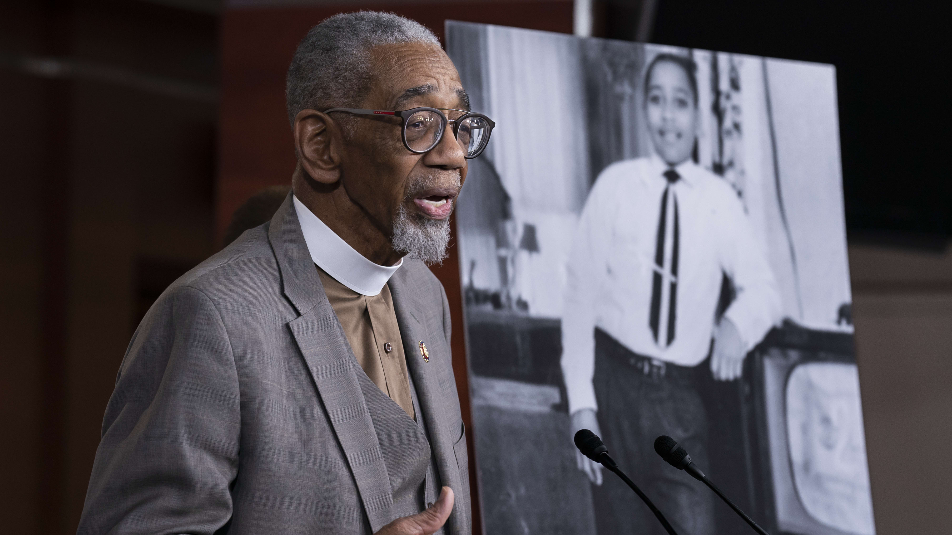 Rep. Bobby Rush stands in front of a picture of Emmett Till.