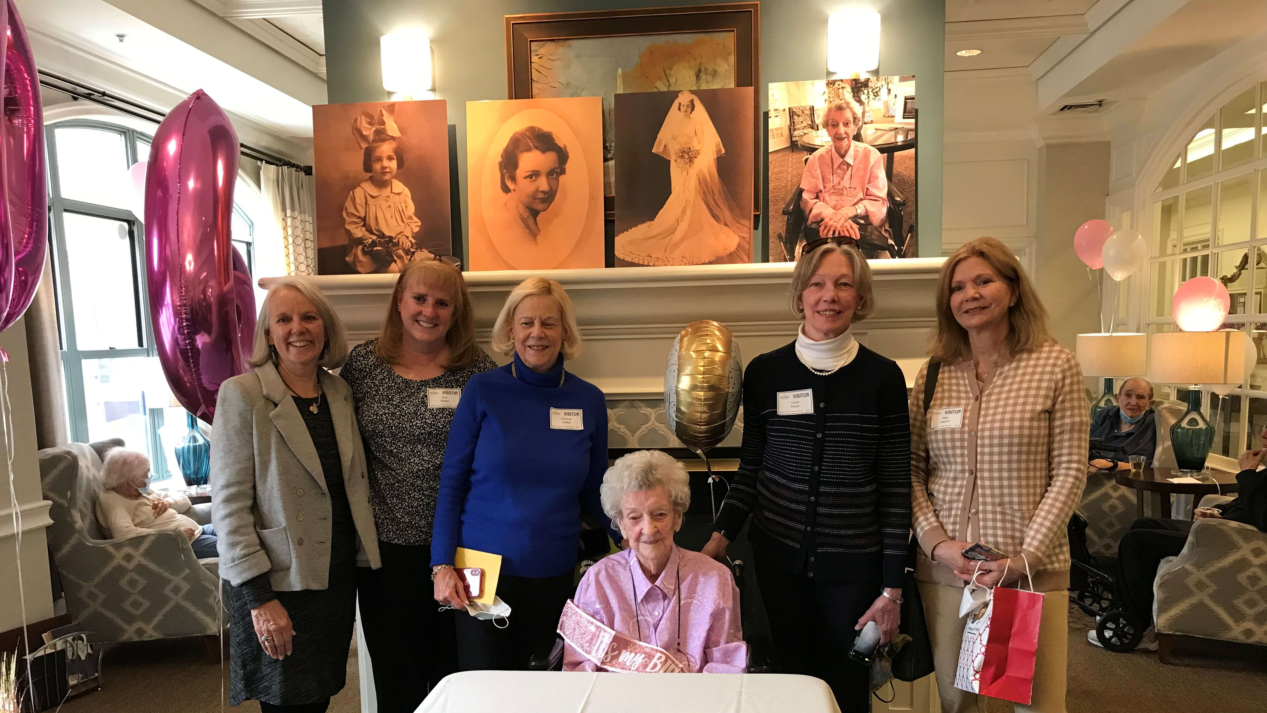 Janet Crampton with friends at her 106th birthday party.