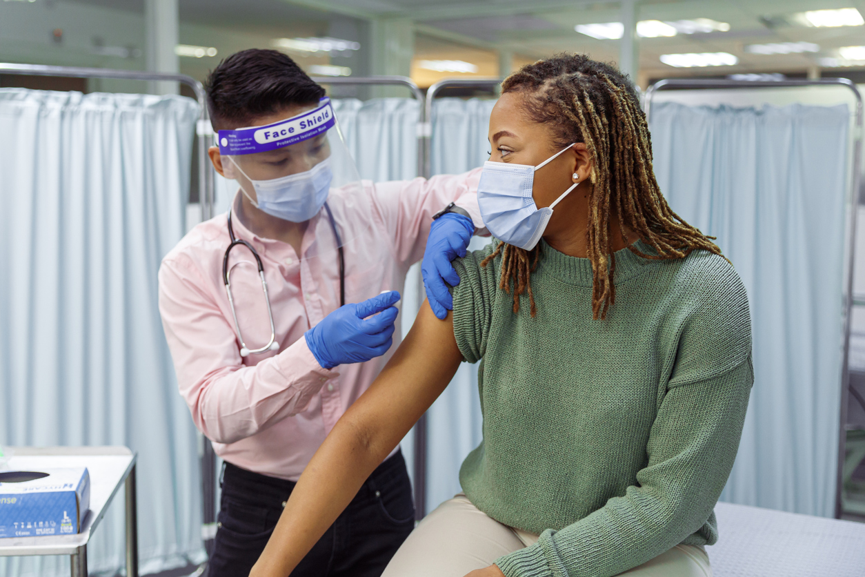 Women getting COVID vaccine