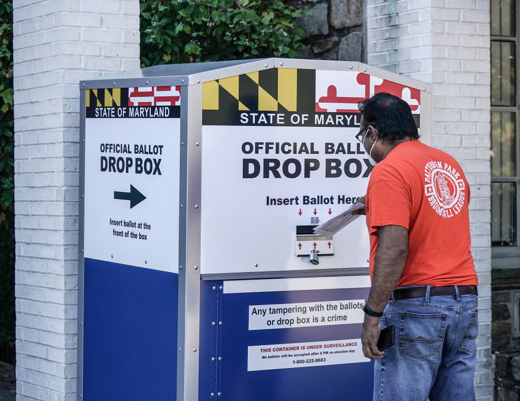 Maryland voter at a ballot drop box.