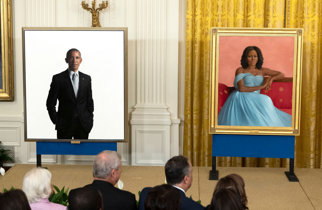 Barack and Michelle Obama portraits.