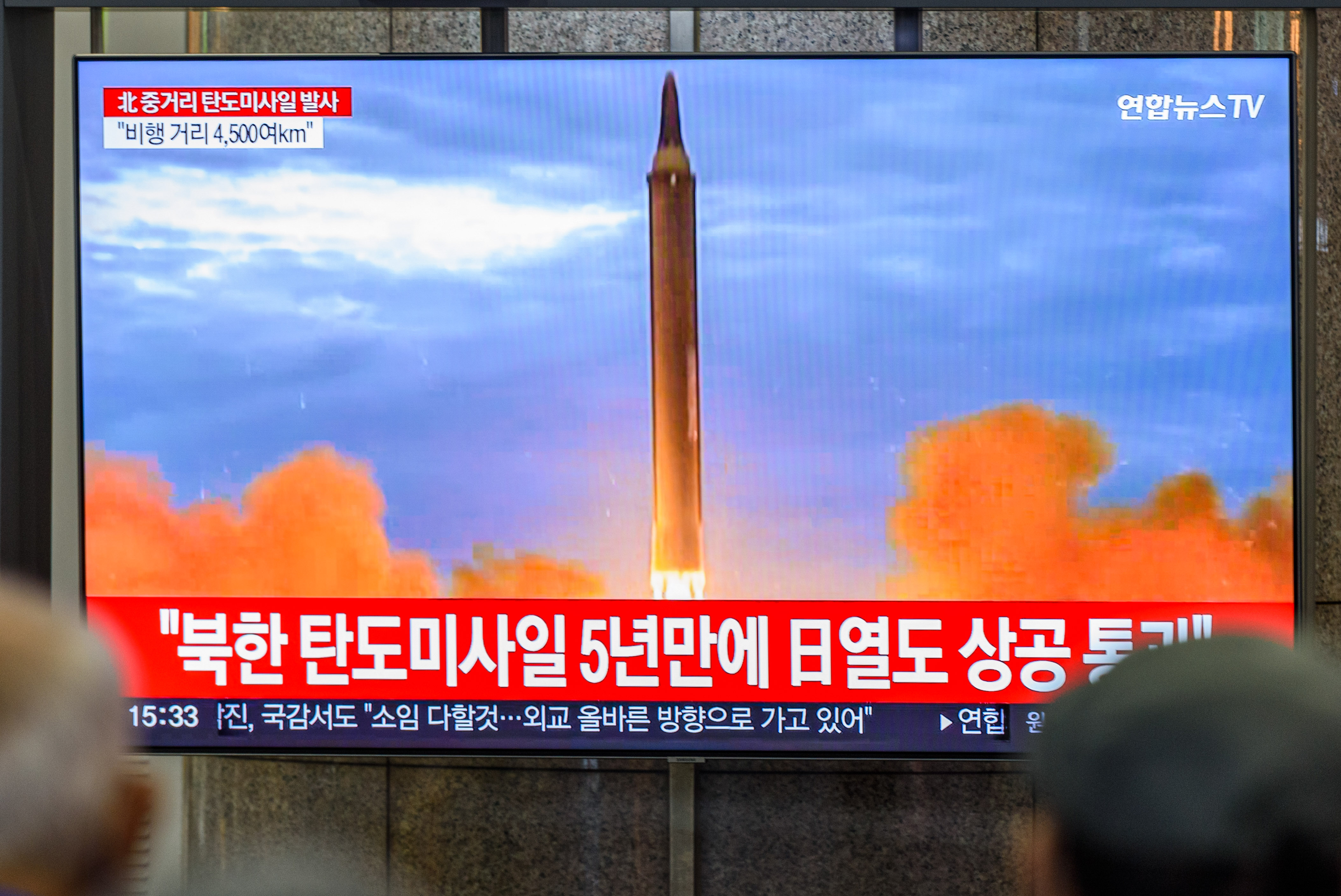 A view of a TV screen on Oct. 4 in which a North Korean missile is being fired. 