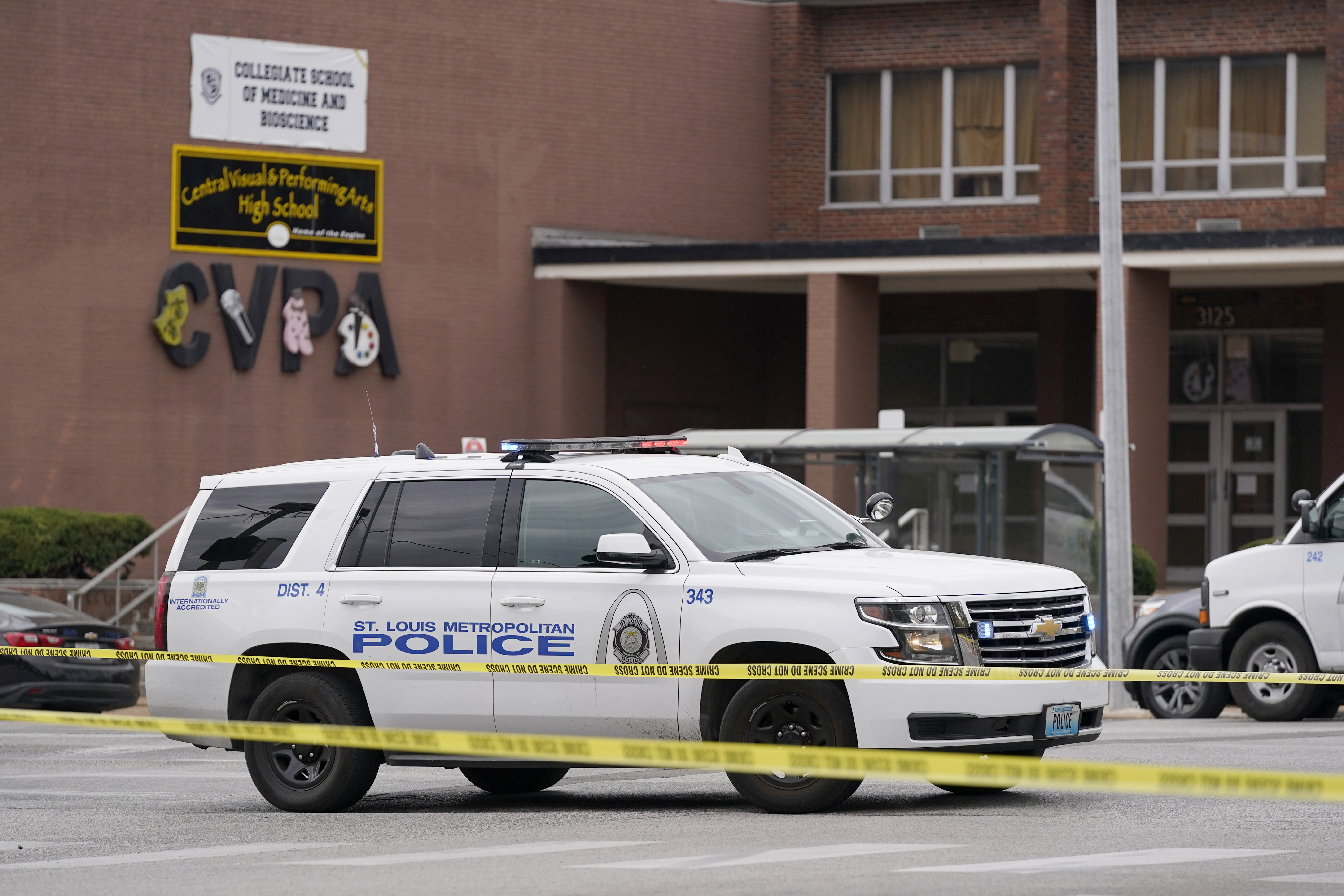Police outside scene of St. Louis high school shooting.