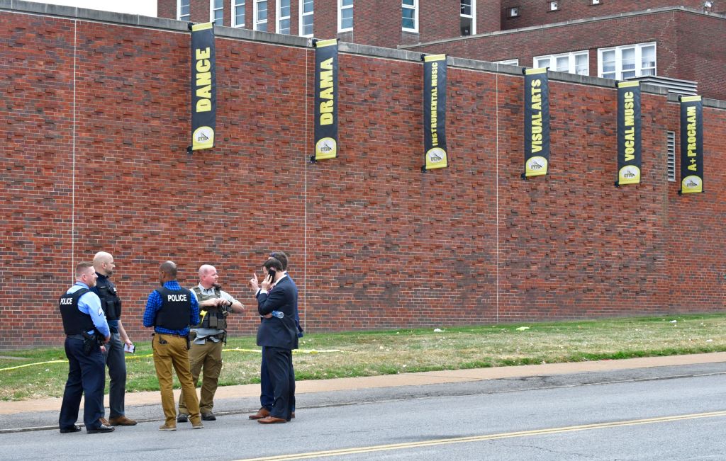 Authorities outside St. Louis high school.