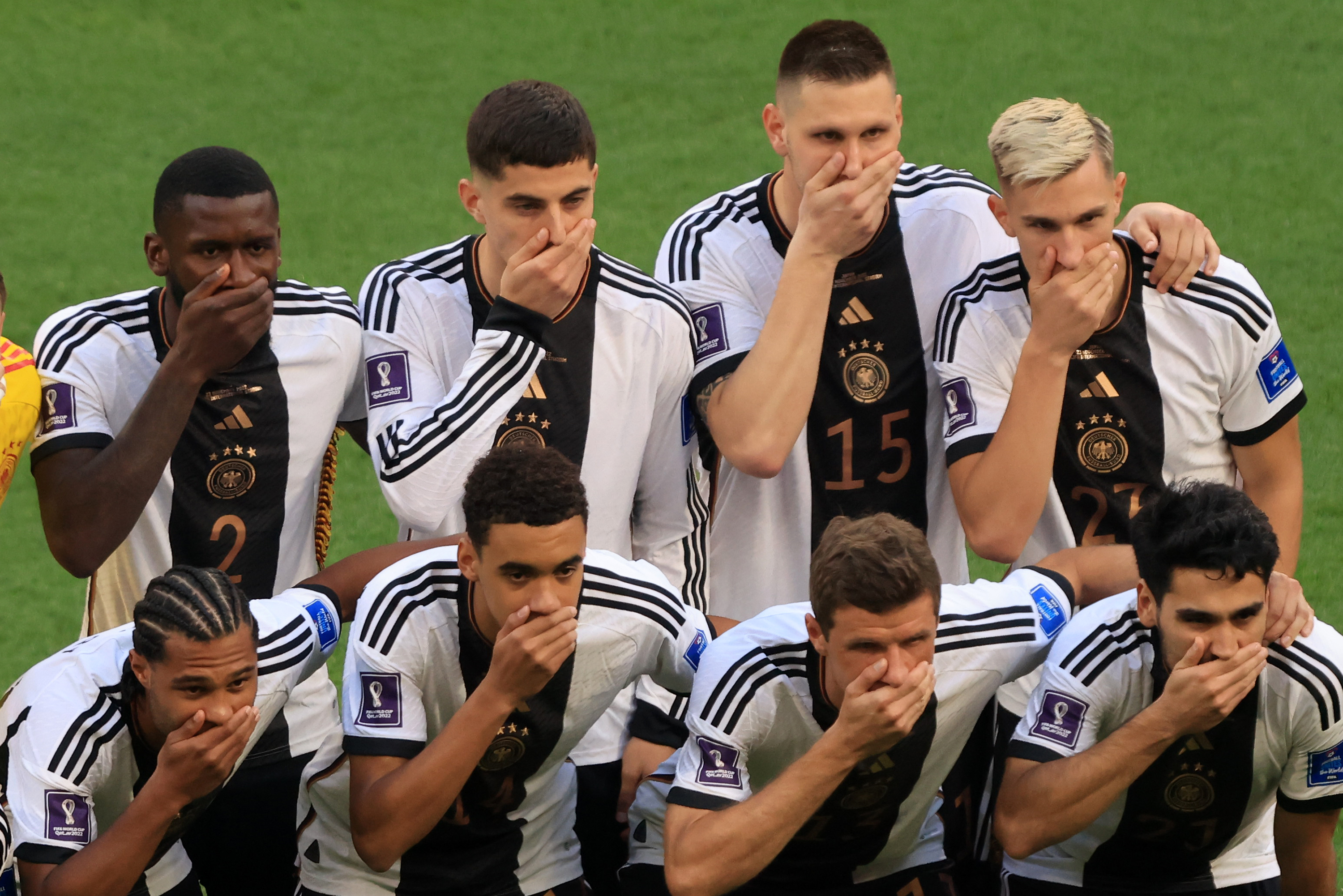 The German national soccer team protests during the 2022 World Cup. 