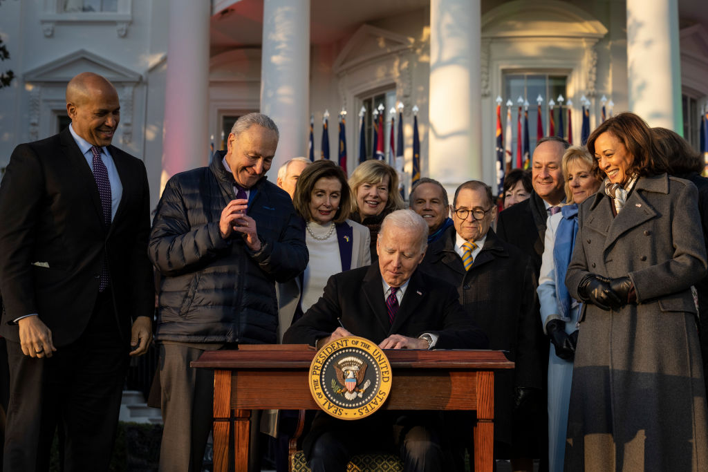 President Joe Biden signs the Respect for Marriage Act on the South Lawn of the White House