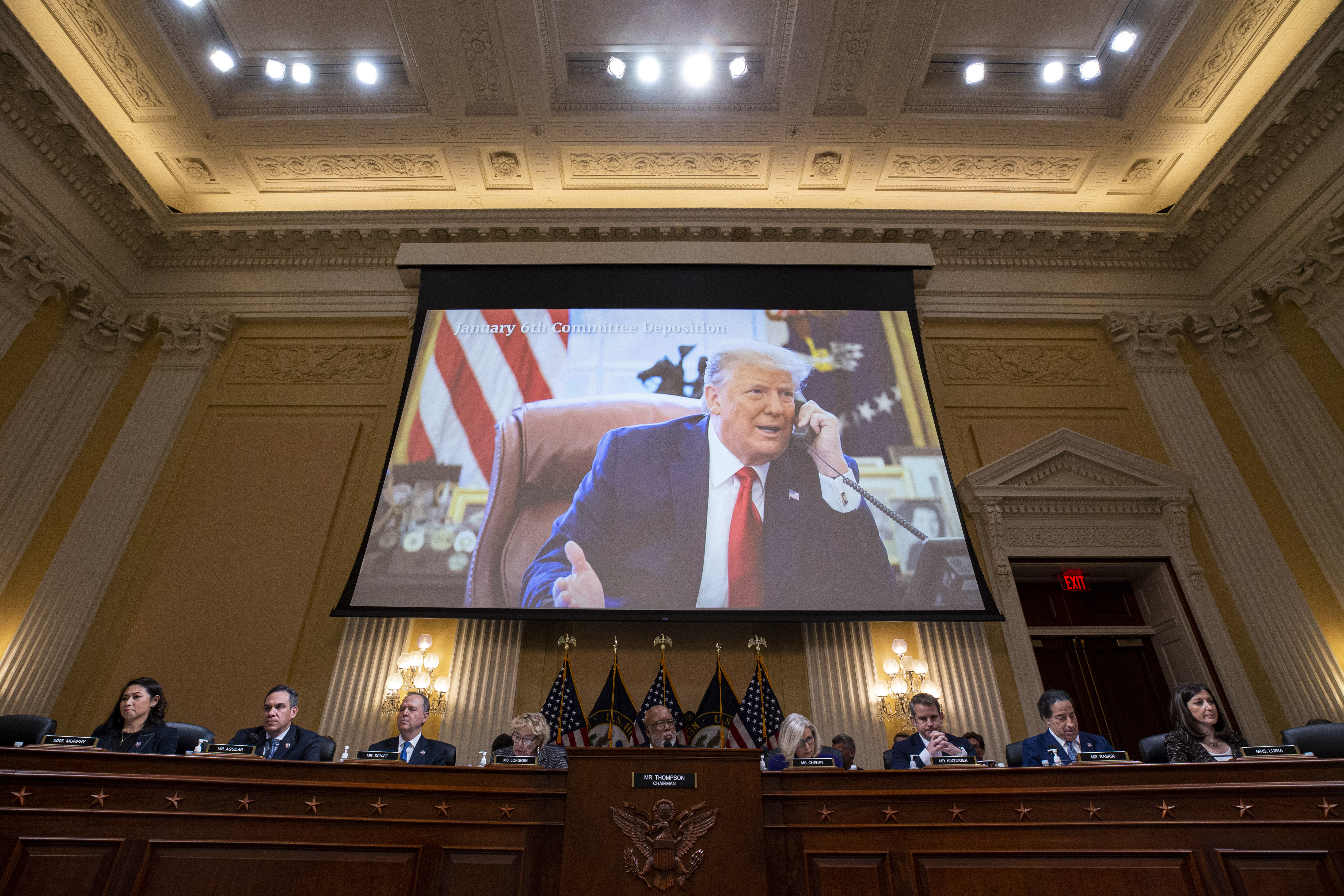 January 6 committee members display photo of Donald Trump