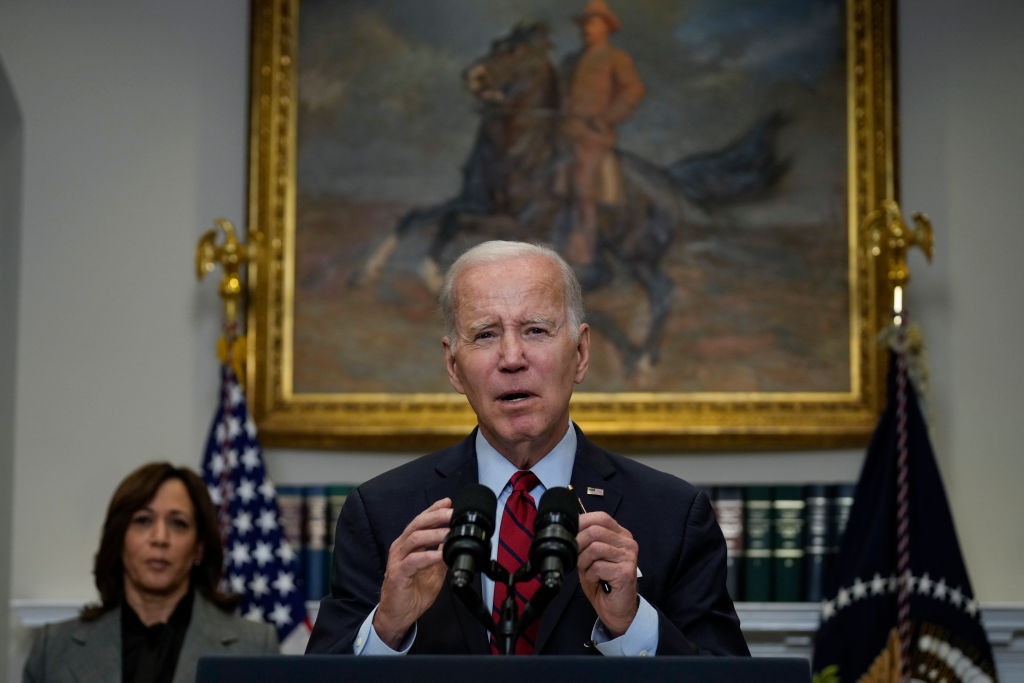 Biden giving speech, Harris in background