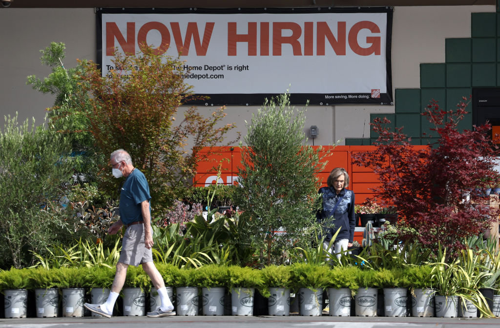 A &quot;now hiring&quot; sign is posted at a Home Depot store