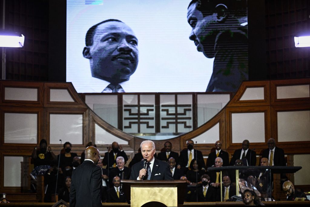 Biden honors MLK during service at Atlanta church.