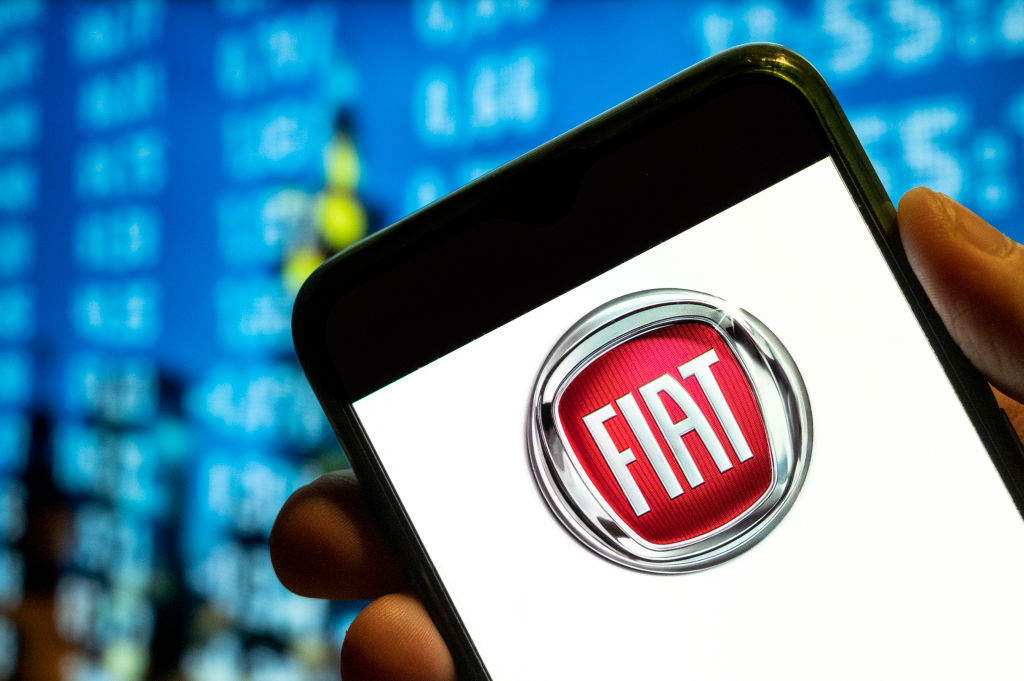 Fiat logo is displayed on a smartphone screen