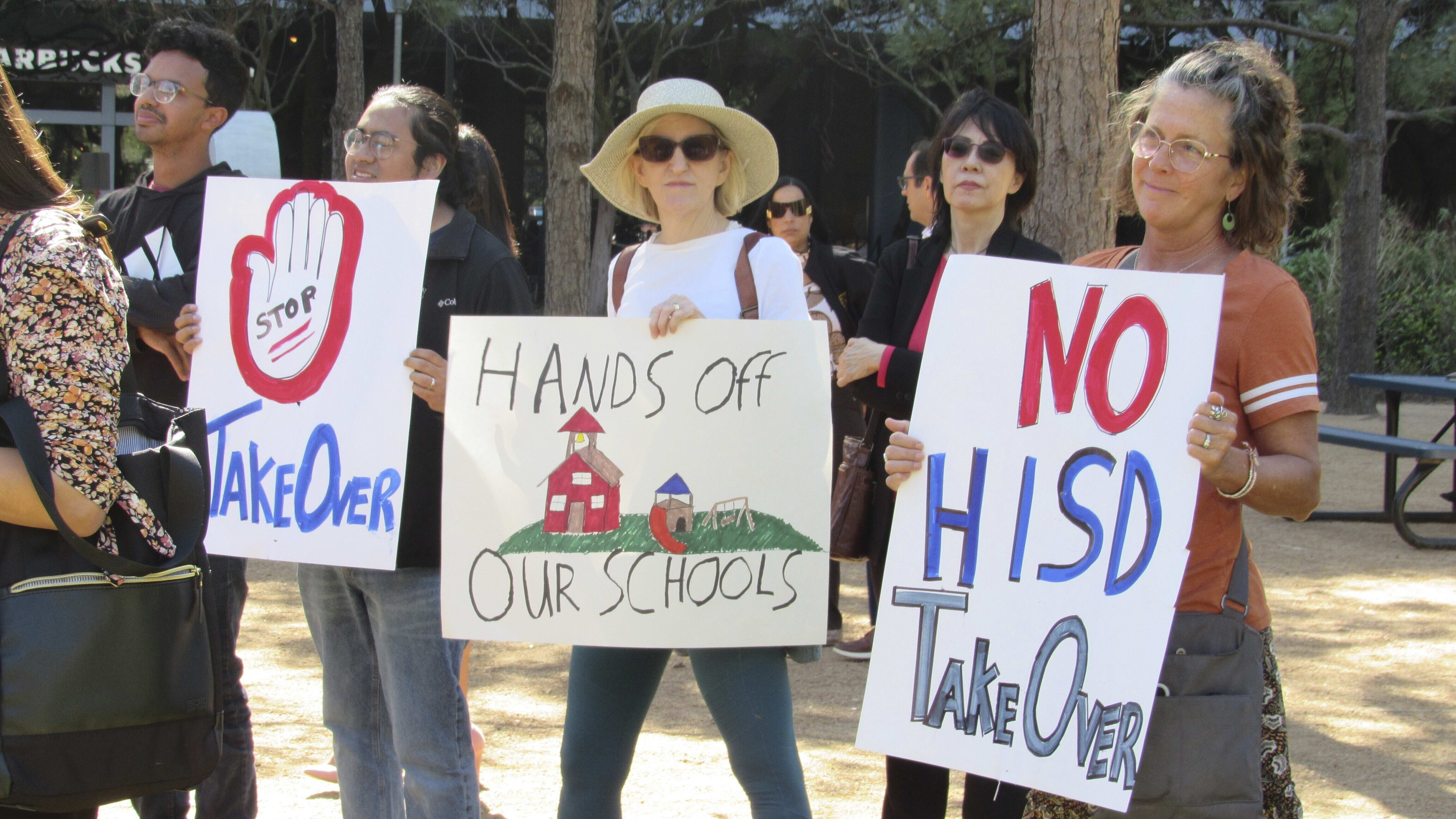 People protesting the takeover of the Houston Independent School District.