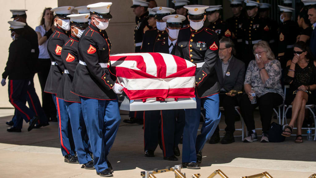 Pallbearers carry the casket of Marine Sgt. Nicole L. Gee, who was killed in the Kabul airport bombing.