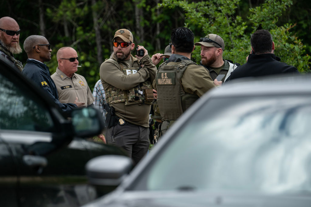 FBI officers following a mass shooting in Cleveland, Texas. 