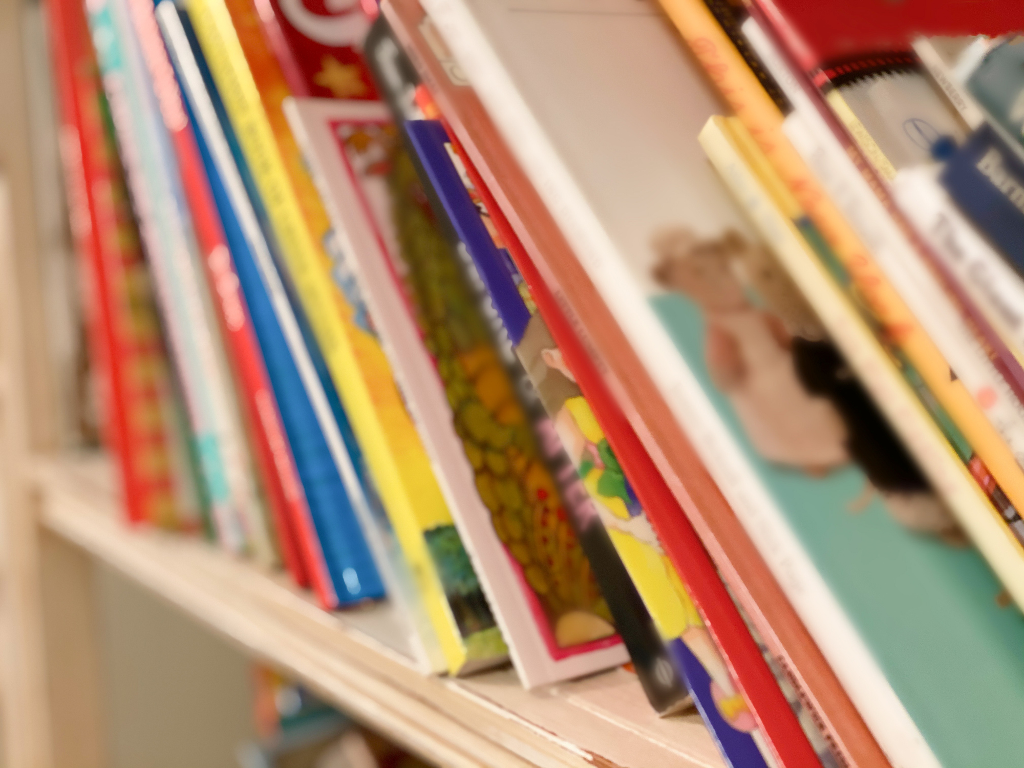 stock photo of children&#039;s books on a shelf
