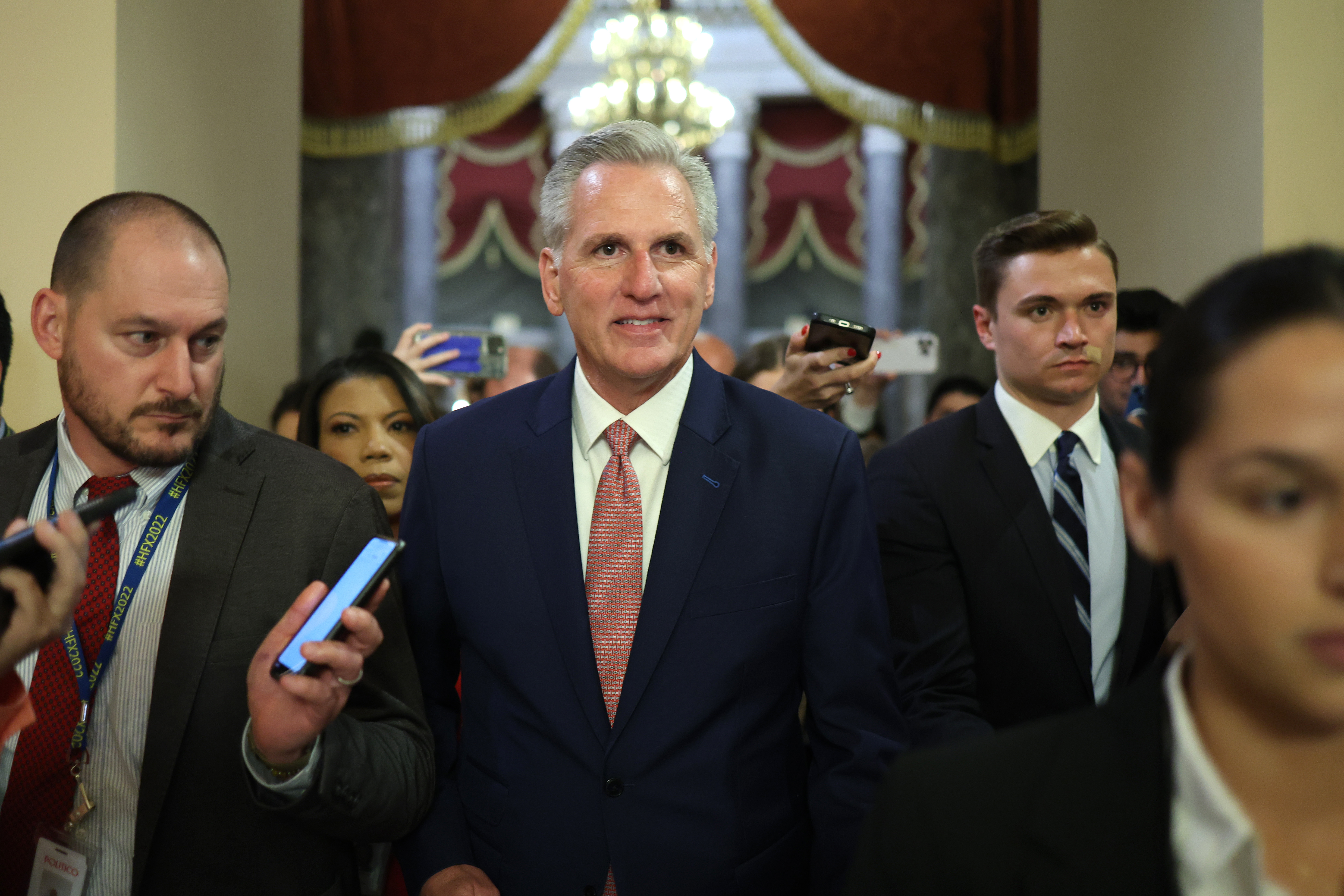 Kevin McCarthy surrounded by reporters and colleagues
